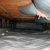 A sealed crawl space with an insulated hot air duct in Davenport.