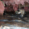 Fiberglass insulation dripping off some heating ducts in a wet crawl space in Coal Valley.