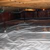 A sealed crawl space with support posts showing in Bloomington.