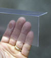 Closeup of a clear plastic covering on a Rock Island crawl space block wall
