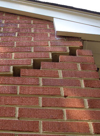 photo of a rotating foundation wall with cracks in Spring Valley