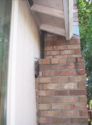 sinking, leaning chimneys that are in danger of collapse in Dixon