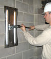 Tightening a wall anchor plate in Waterloo, Illinois and Iowa