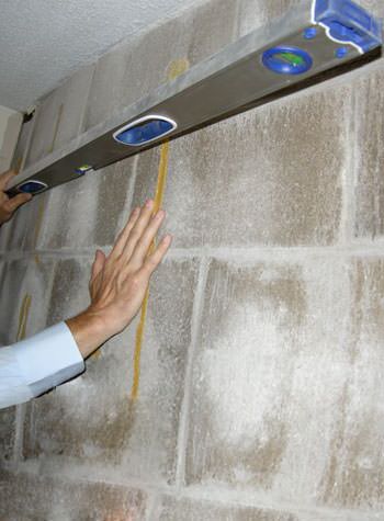 severe foundation wall failure symptoms of a basement wall in Hickory Grove