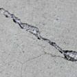 sinking outdoor concrete in need of mudjacking in Cedar Rapids