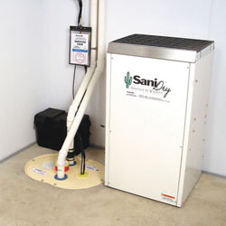 Sump pump system, dehumidifier, and basement wall panels installed during a sump pump installation in Bettendorf