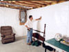 A basement wall covering for creating a vapor barrier on basement walls in Marion