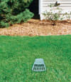 A buried gutter drain downspout extension installed in a Evansdale home