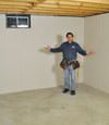Dubuque basement insulation covered by EverLast wall paneling, with SilverGlo insulation underneath