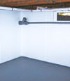 Davenport, IL and IA wet basement wall covering that tucks into a perimeter drainage system