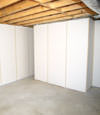 Fiberglass insulated basement wall system in Pekin, IL and IA