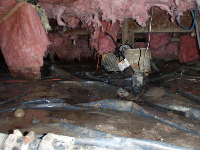 We Clean Crawl Es In Illinois And Iowa E Cleanup Fibergl Insulation Dripping Off Some Heating Ducts In A Wet Crawl E Princeton