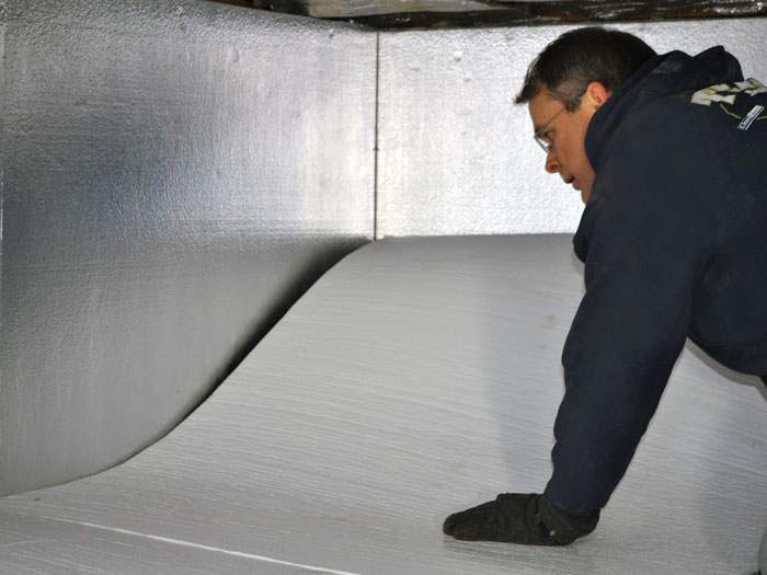 Crawl E Insulation With Terrablock In Illinois And Iowa A Contractor Installing Terrablock Floor Insulation In Moline Crawl E