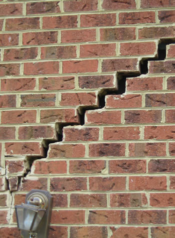 major cracking of a brick foundation wall in Coal Valley