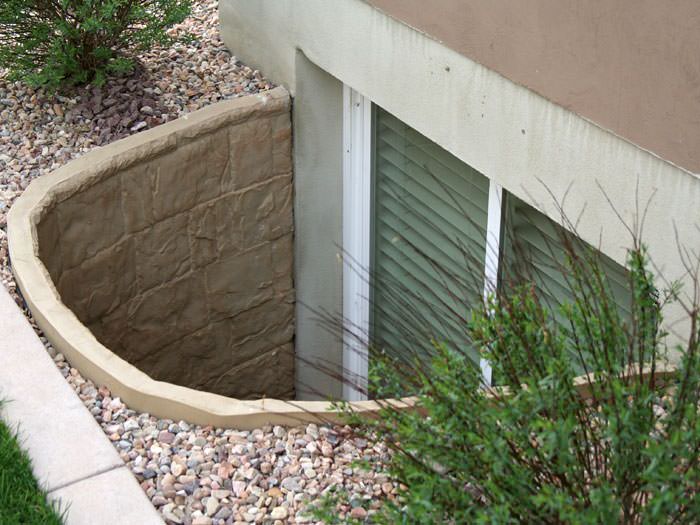 egress window wells cinder block durable plastic egress window well installed in rock garden clinton basement window system egress well egress window wells cinder block durable plastic egress window well installed in rock garden clinton basement window system egress well